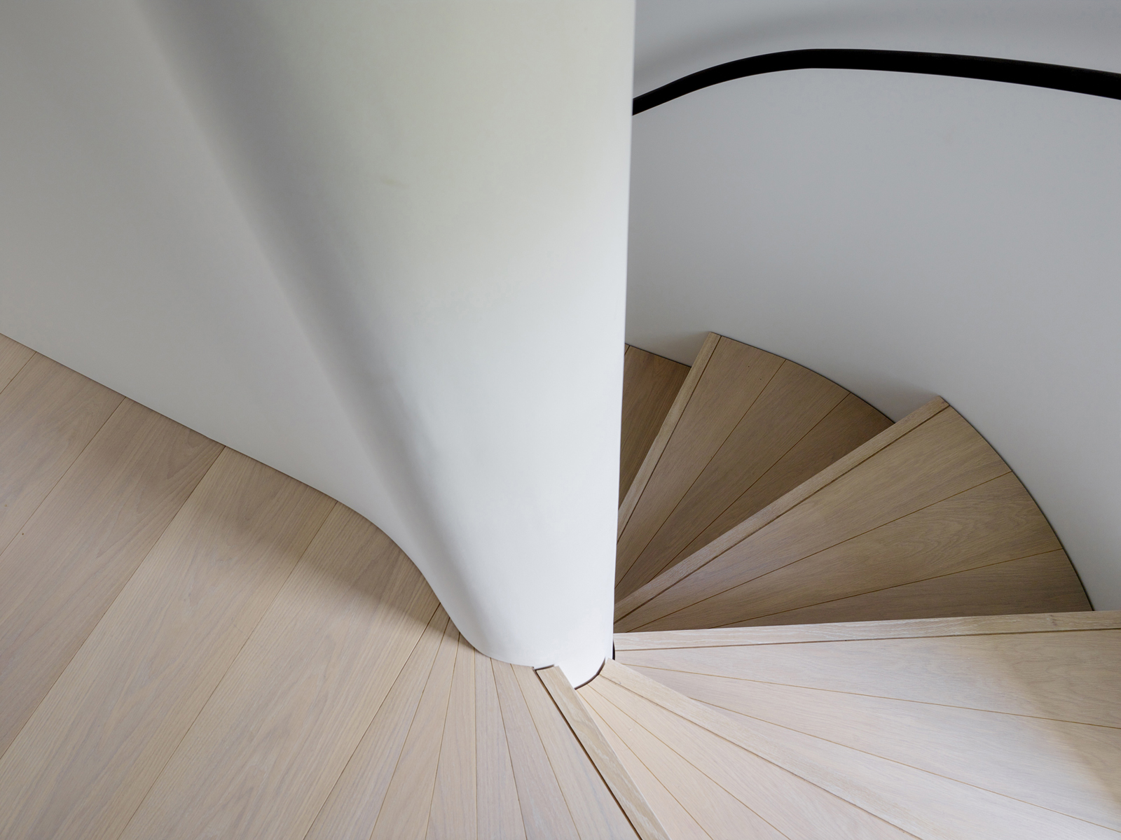 Curved timber stair shadow gap detail