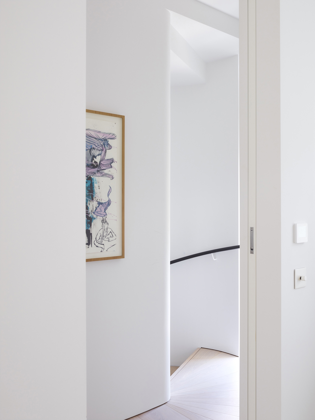minimal stairwell with art